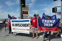 Selwyn Harris/Pahrump Valley Times Several dozen supporters of President Trump gathered at the ...