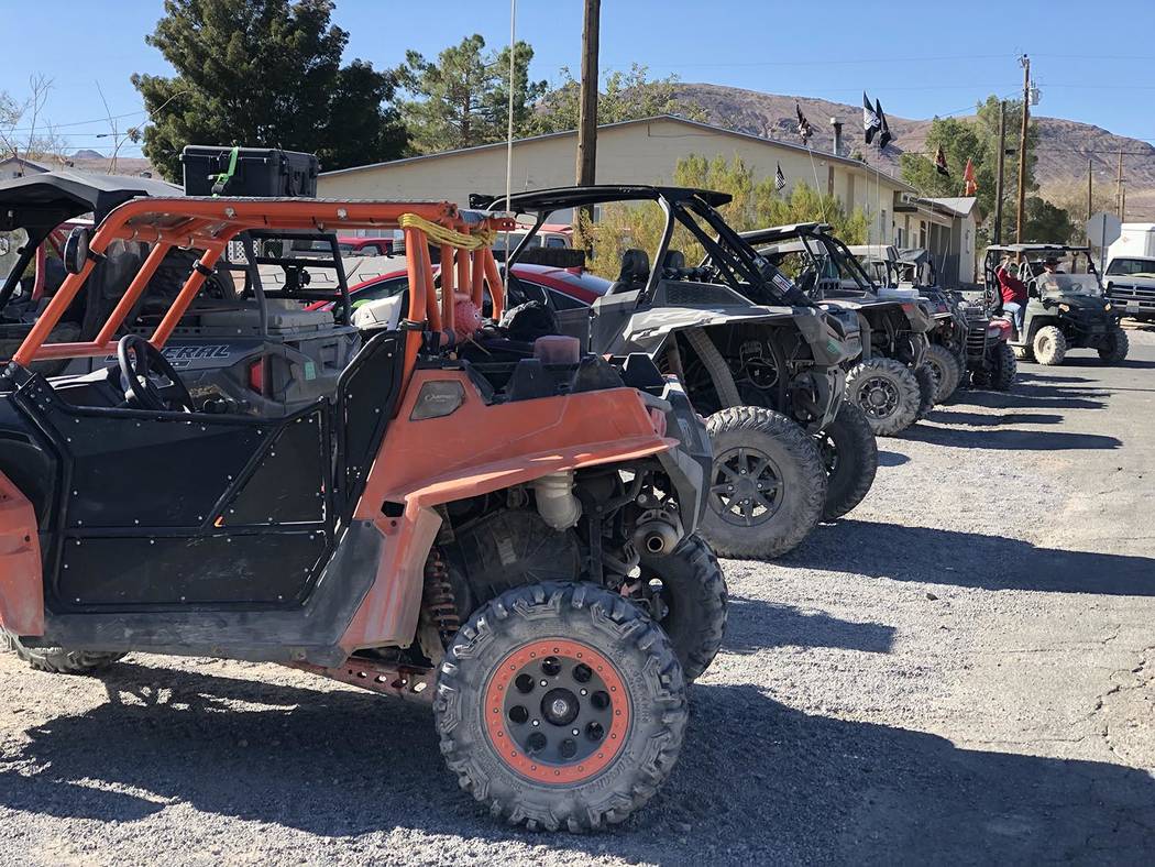 Tom Rysinski/Pahrump Valley Times Vehicles show the wear and tear of 50 miles of off-road drivi ...