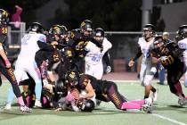 Peter Davis/Special to the Pahrump Valley Times A Western player is stopped after a short gain ...