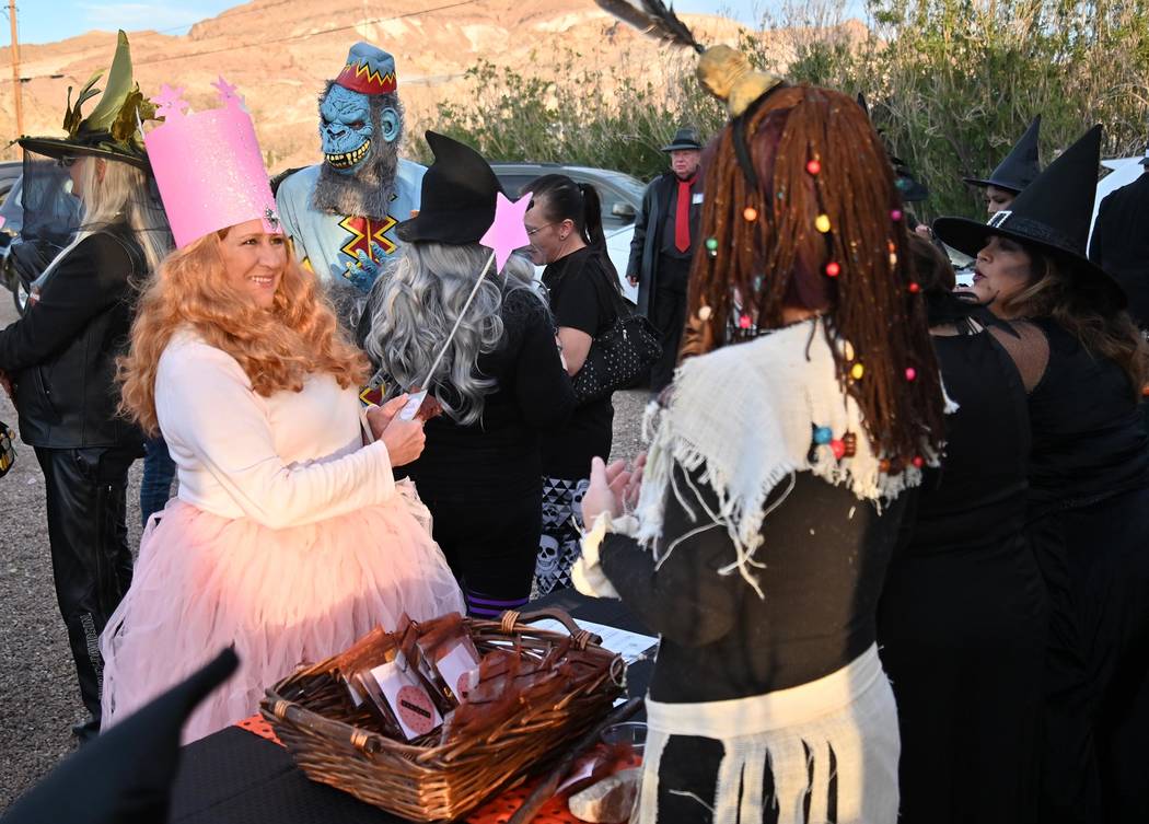 Richard Stephens/Special to the Pahrump Valley Times A "good witch" signs in at the table where ...