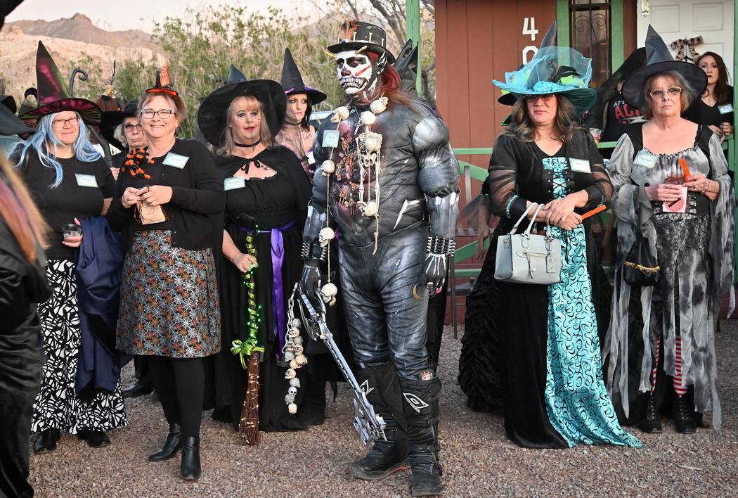 Richard Stephens/Special to the Pahrump Valley Times Witches and a warlock gather in front of S ...