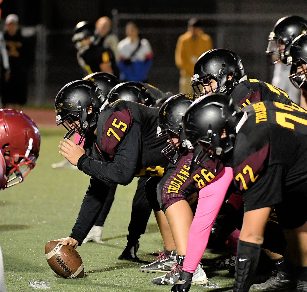 Peter Davis/Special to the Pahrump Valley Times Offensive linemen Caleb Sproul (72), Anthony Pe ...
