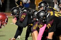 Peter Davis/Special to the Pahrump Valley Times Offensive linemen Caleb Sproul (72), Anthony Pe ...