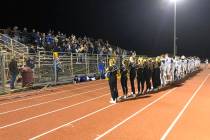 Tom Rysinski/Pahrump Valley Times Moapa Valley players, cheerleaders and fans sing the school s ...