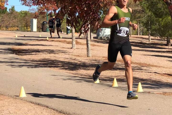 Tom Rysinski/Pahrump Valley Times Beatty High School senior Jose Granados leads the pack early ...