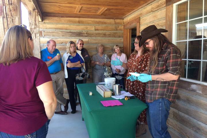 Robin Hebrock/Pahrump Valley Times Martha Wehrly and her assistant demonstrate soap making to a ...