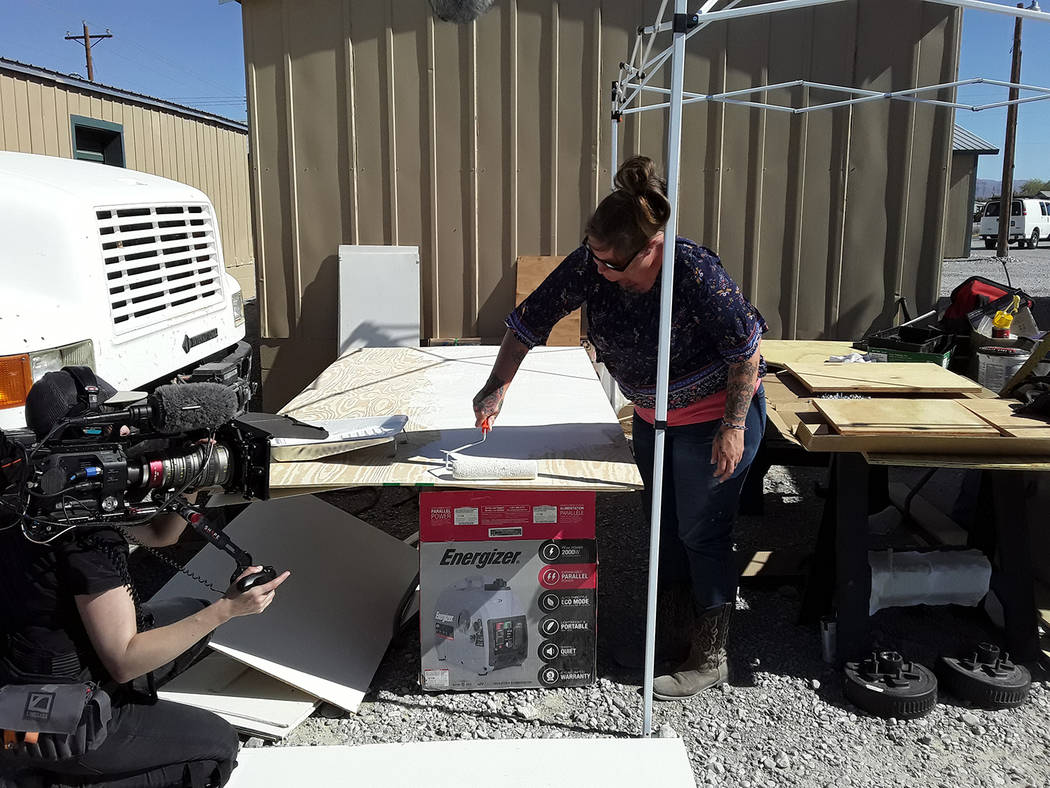 Selwyn Harris/Pahrump Valley Times A nomad volunteer applies paint to what will eventually beco ...