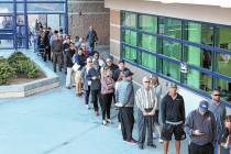 Voters lined up to cast their vote at a polling station at Coronado High School on Tuesday, Nov ...