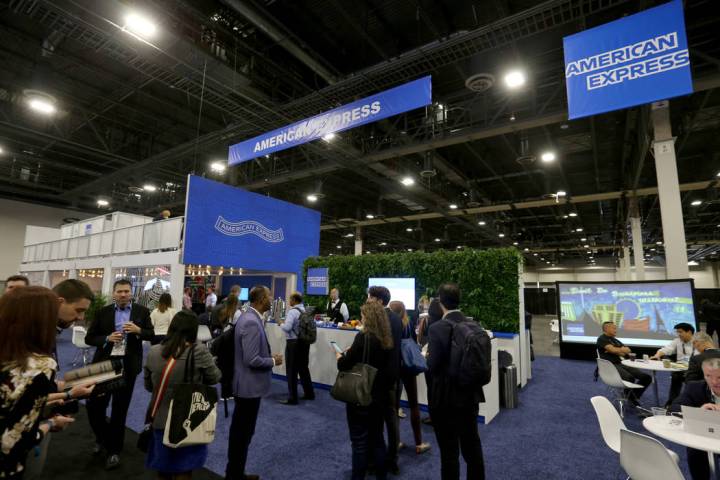 K.M. Cannon Las Vegas Review-Journal Conventioneers mingle at the American Express lounge at t ...