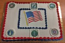 Robin Hebrock/Pahrump Valley Times A cake bearing the seals of each of the branches of the U.S. ...