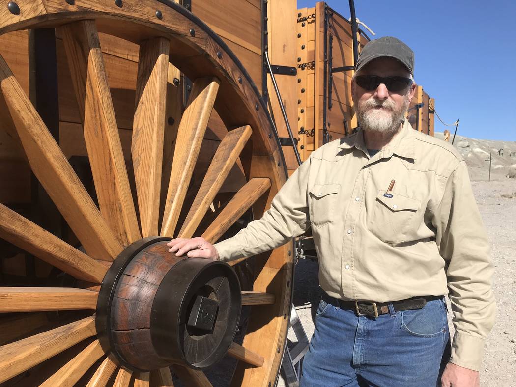 Jeffrey Meehan/Pahrump Valley Times Wagonmaker Dave Engel stands in front of one of two wagons ...