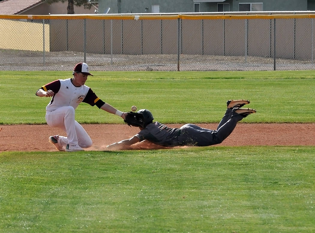 Horace Langford Jr./Pahrump Valley Times Pahrump Valley's Chase McDaniel waits for the throw as ...