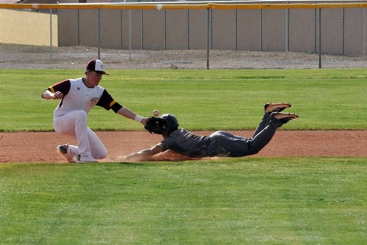 Horace Langford Jr./Pahrump Valley Times Pahrump Valley's Chase McDaniel waits for the throw as ...