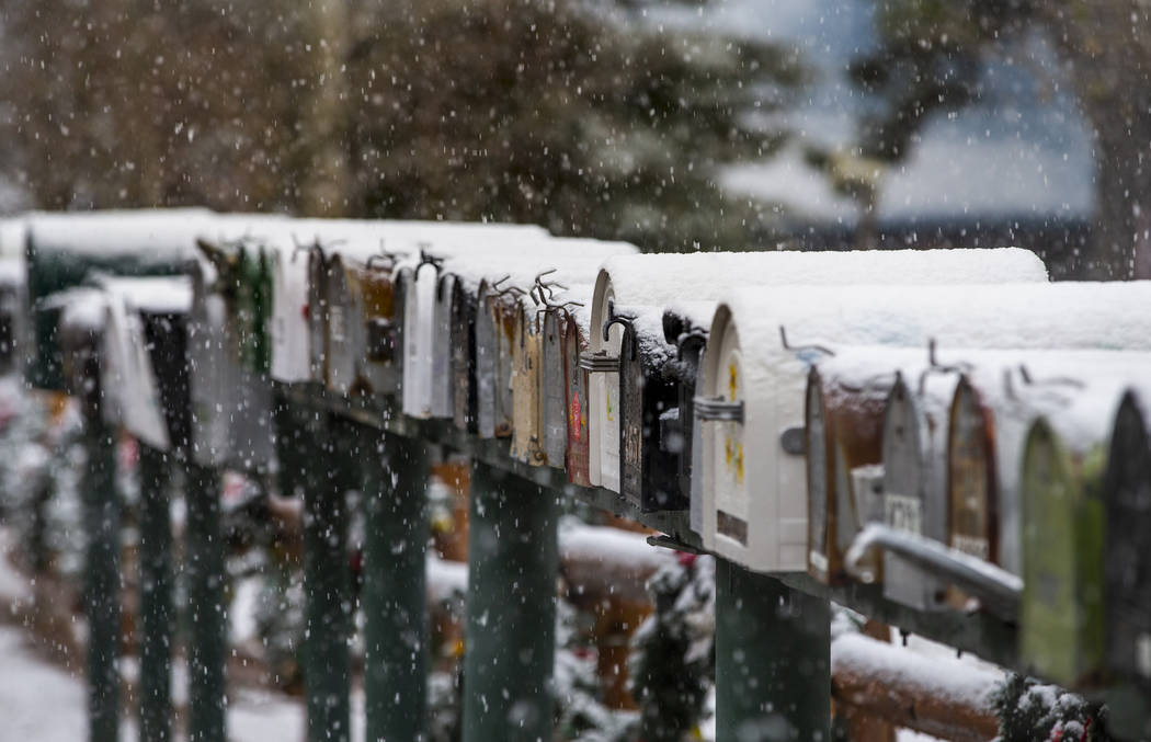 Snow covered mailboxes in Old Town at Mount Charleston on Wednesday, Nov. 20, 2019. (L.E. Basko ...