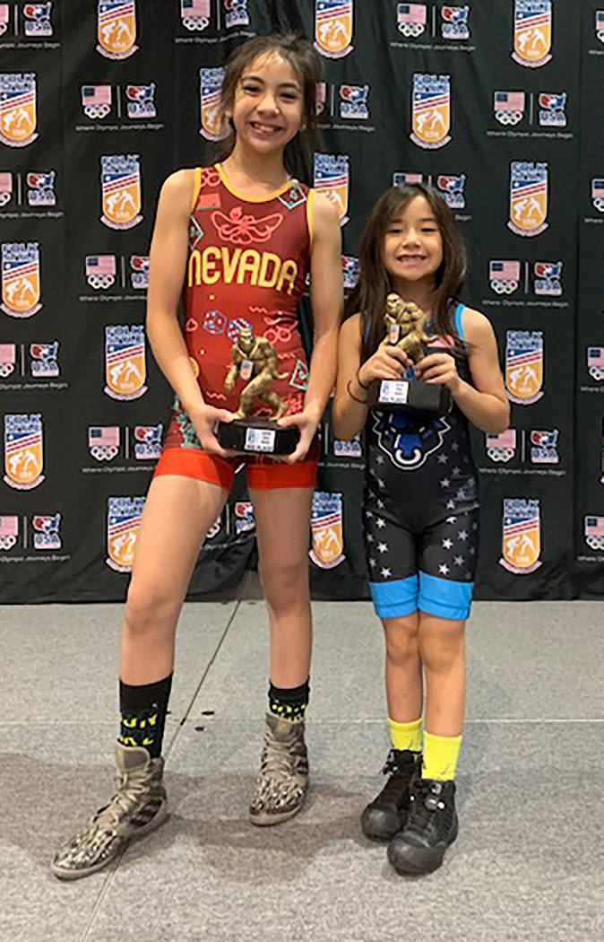 Special to the Pahrump Valley Times Mika, left, and Suri Yoffee show off their third-place trop ...