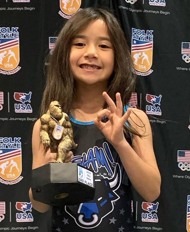 Special to the Pahrump Valley Times Suri Yoffee, 8, flashes three fingers, signifying her third ...