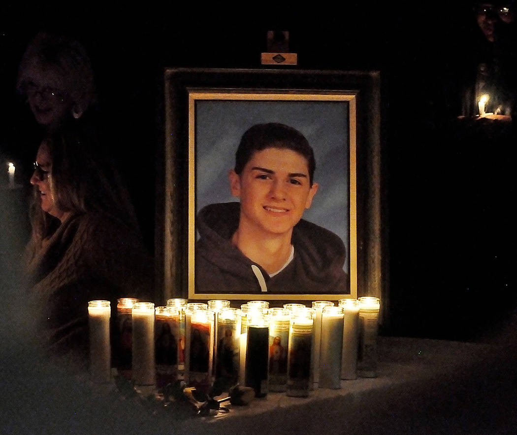 Horace Langford Jr./Pahrump Valley Times A candlelit shrine bearing Ethan Osterman’s image w ...
