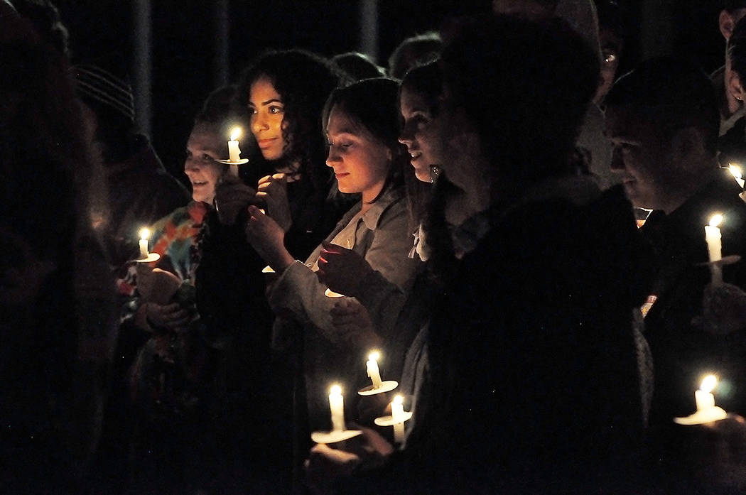 Horace Langford Jr./Pahrump Valley Times Those who attended the candlelight vigil remembered th ...