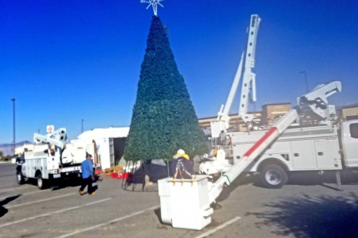 David Jacobs/Pahrump Valley Times Pahrump’s community Christmas tree was being put into place ...