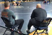 Tom Rysinski/Pahrump Valley Times Pahrump Valley High School wrestling coach Craig Rieger, left ...