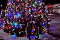 Horace Langford Jr./Pahrump Valley Times Bathed in the glow of festive lights, captivated young ...