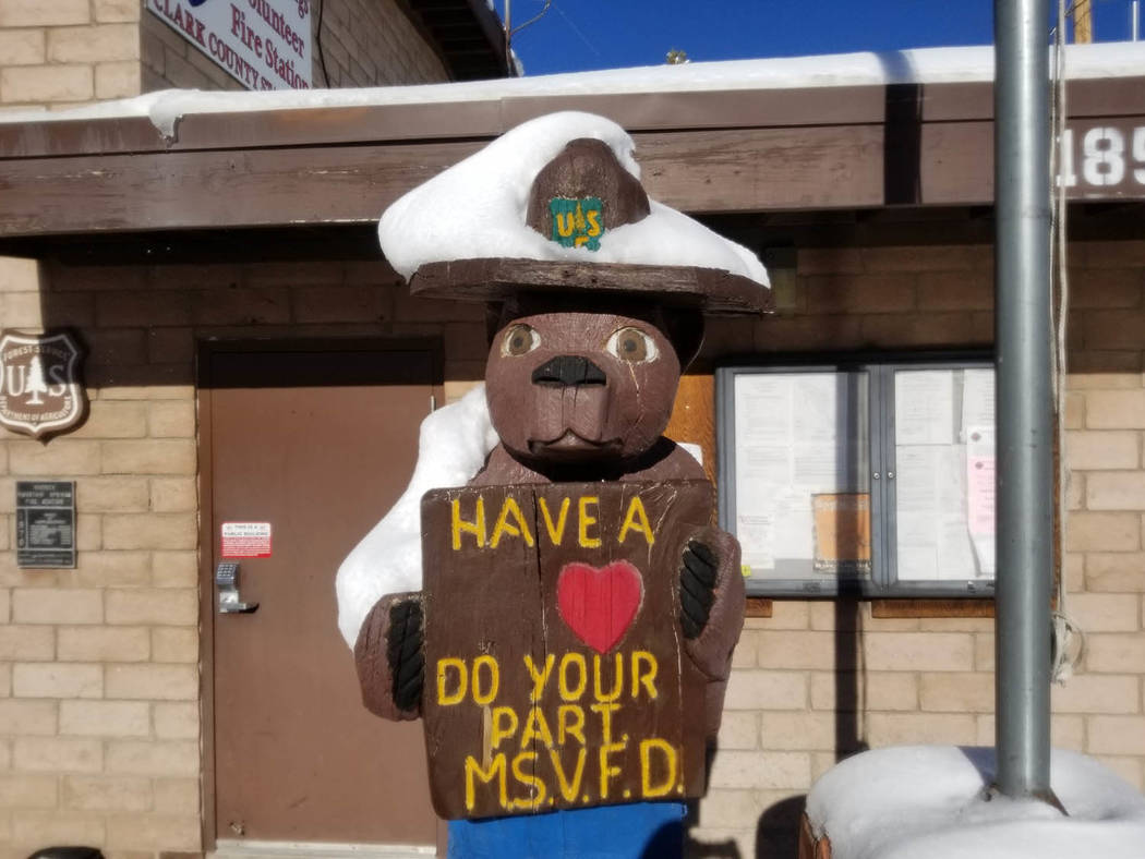 David Jacobs/Pahrump Valley Times Snow rests on the ranger hat of Smokey Bear at Mountain Sprin ...