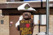 David Jacobs/Pahrump Valley Times Snow rests on the ranger hat of Smokey Bear at Mountain Sprin ...