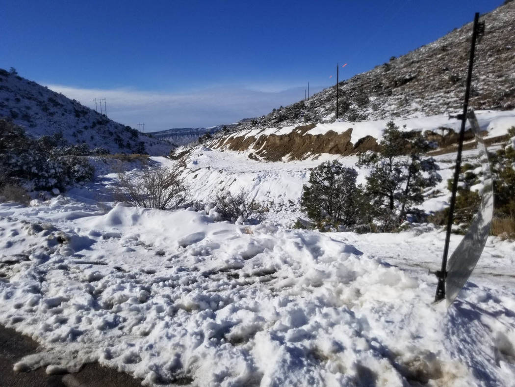 David Jacobs/Pahrump Valley Times Snow glistens off the landscape in the Mountain Springs commu ...