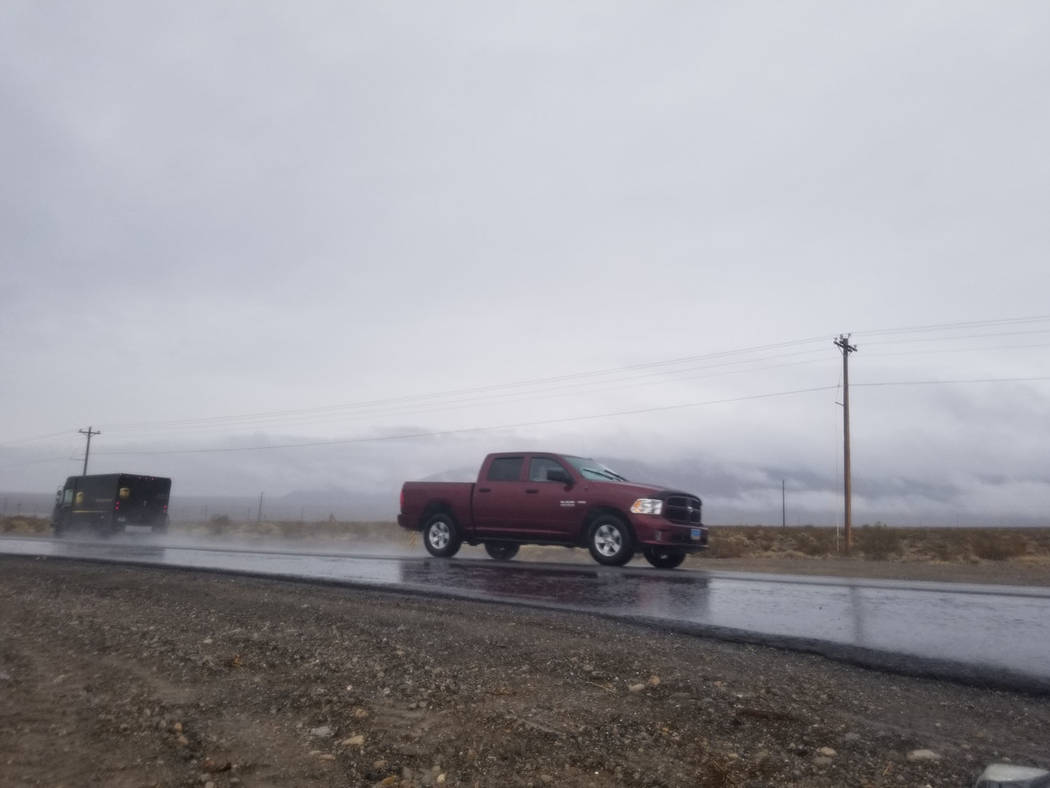 David Jacobs/Pahrump Valley Times Rain slickens Nevada Highway 160 in Pahrump as shown in this ...