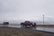 David Jacobs/Pahrump Valley Times Rain slickens Nevada Highway 160 in Pahrump as shown in this ...