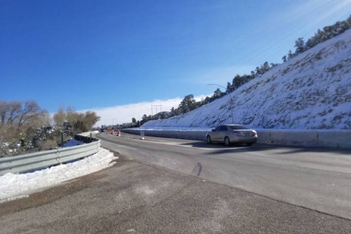 David Jacobs/Pahrump Valley Times A vehicle passes through Nevada Highway 160 in the Mountain S ...