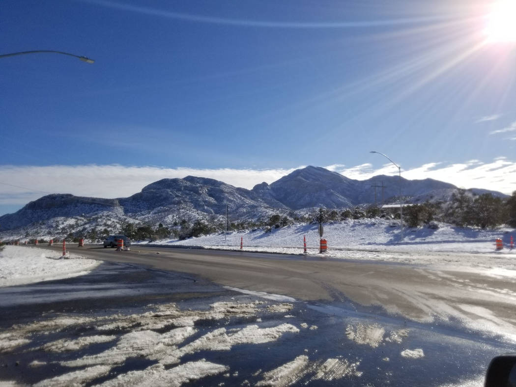 David Jacobs/Pahrump Valley Times Sun shines on the snow-covered mountains on the Mountain Spri ...