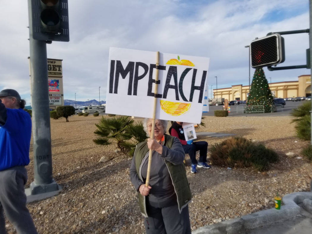 David Jacobs/Pahrump Valley Times Protesters gather in Pahrump at Nevada Highways 160 and 372 o ...