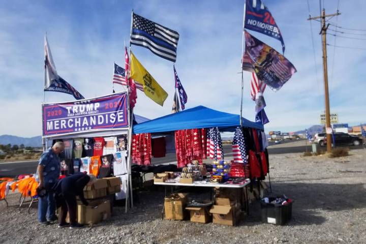 David Jacobs/Pahrump Valley Times A couple visits the traveling Donald Trump merchandise store ...