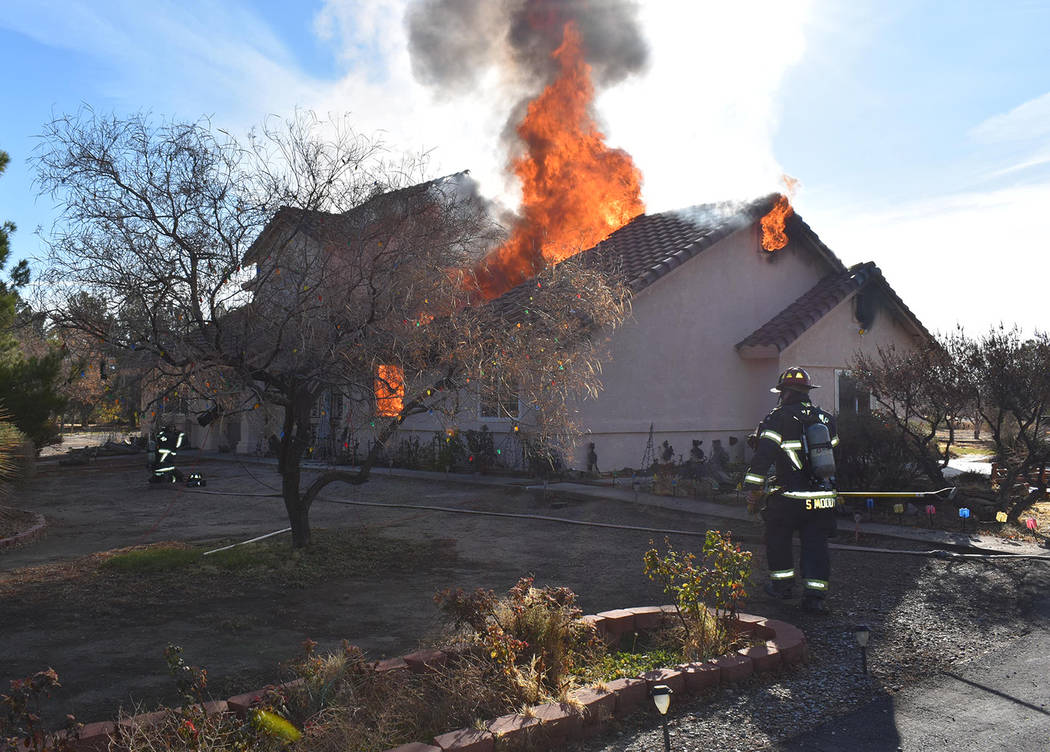 Special to the Pahrump Valley Times Pahrump fire crews were met with heavy fire conditions upon ...