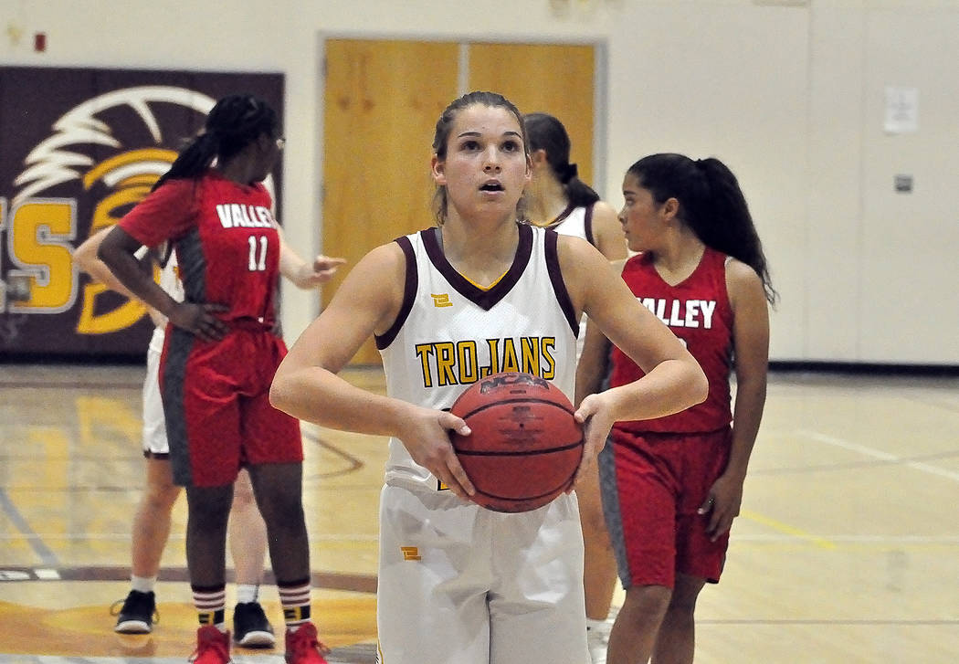 Horace Langford Jr./Pahrump Valley Times Junior Maddy Souza at the line against Valley on Dec. ...