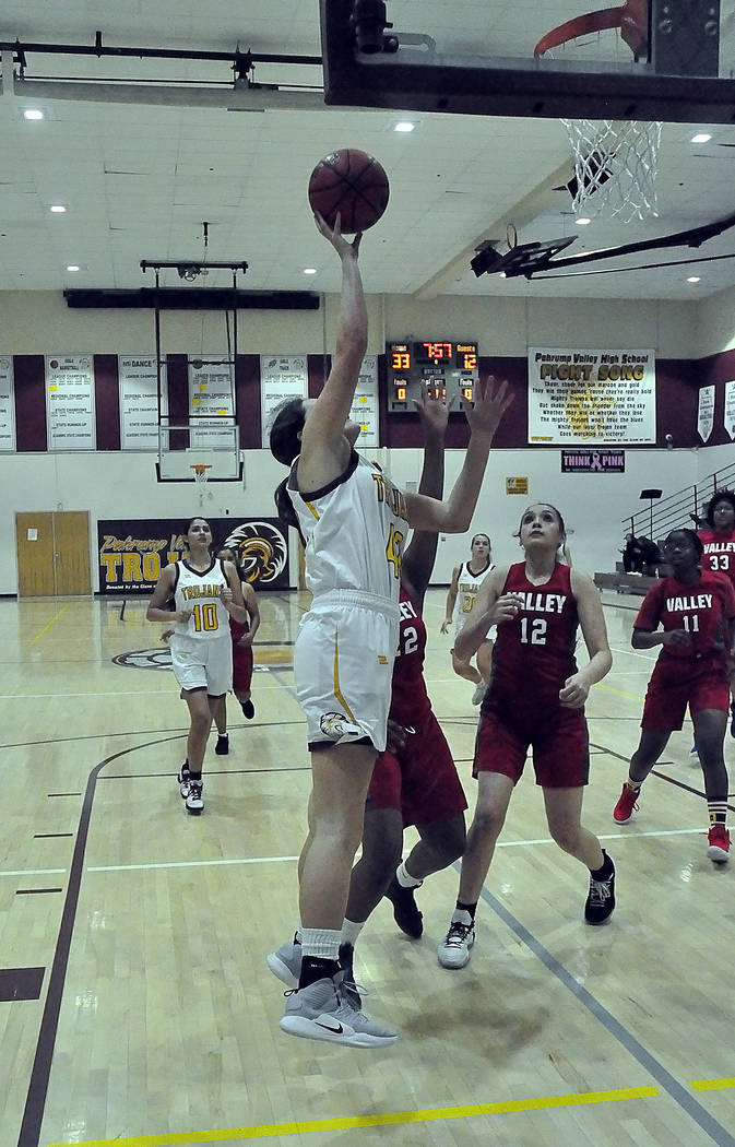 Horace Langford Jr./Pahrump Valley Times Junior Kate Daffer, shown going up for a shot against ...