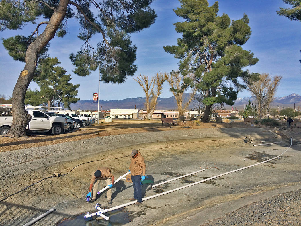 Robin Hebrock/Pahrump Valley Times Buildings and grounds crews are seen installing new pipes in ...