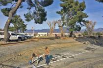 Robin Hebrock/Pahrump Valley Times Buildings and grounds crews are seen installing new pipes in ...