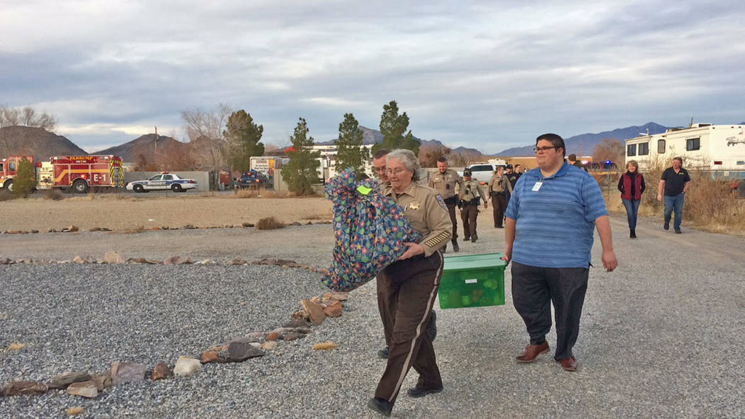 Robin Hebrock/Pahrump Valley Times Nye County Sheriff Sharon Wehrly leads the way to the home o ...