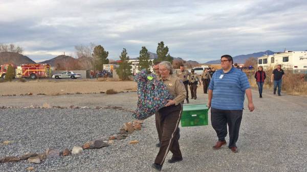 Robin Hebrock/Pahrump Valley Times Nye County Sheriff Sharon Wehrly leads the way to the home o ...