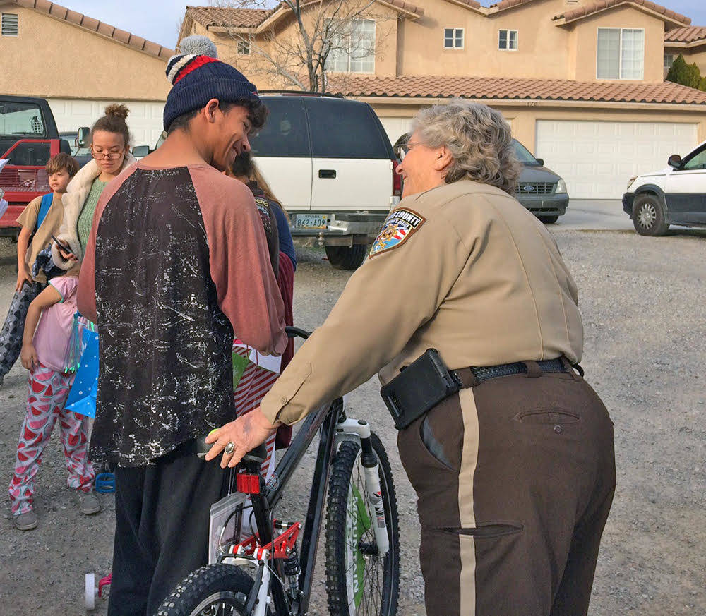 Robin Hebrock/Pahrump Valley Times Nye County Sheriff Sharon Wehrly is pictured exchanging a fe ...