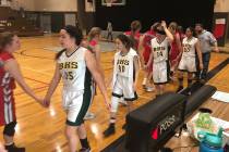 Tom Rysinski/Pahrump Valley Times Players from the Beatty and Tonopah girls basketball teams go ...