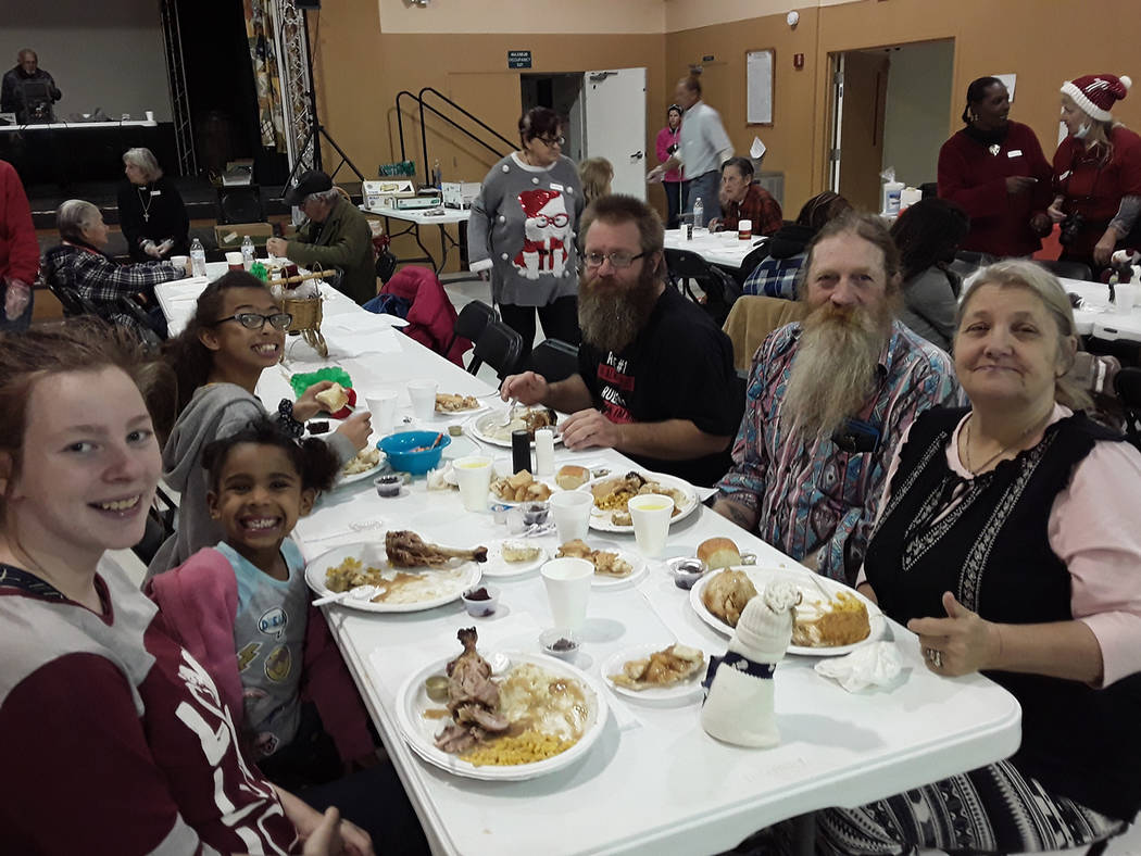 Selwyn Harris/Pahrump Valley Times A local family enjoys a special Christmas dinner on Tuesday ...