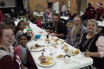 Selwyn Harris/Pahrump Valley Times A local family enjoys a special Christmas dinner on Tuesday ...