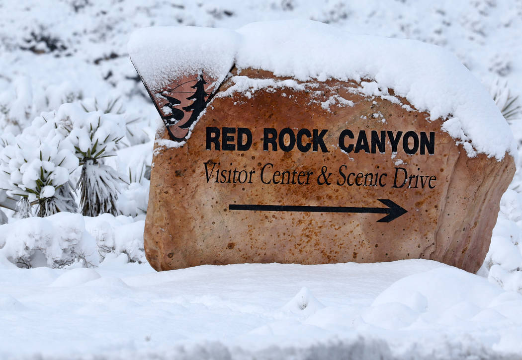 Heidi Fang /Las Vegas Review-Journal The Red Rock Canyon marker at Route 159 is covered in snow ...