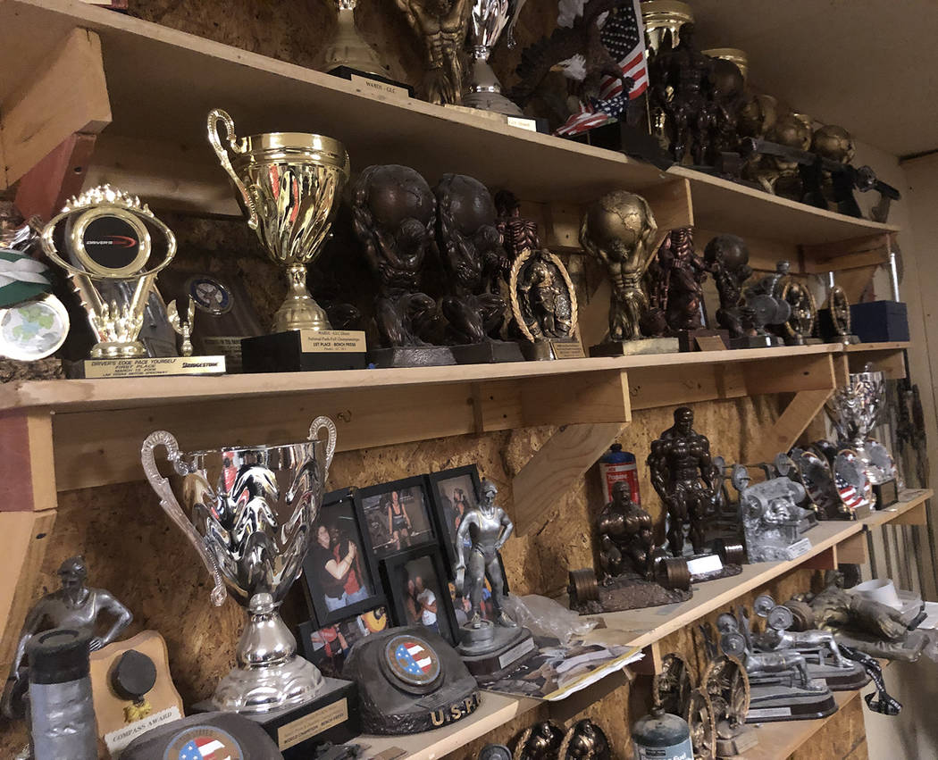 Tom Rysinski/Pahrump Valley Times Some of the dozens of trophies and awards Gary Miller has won ...