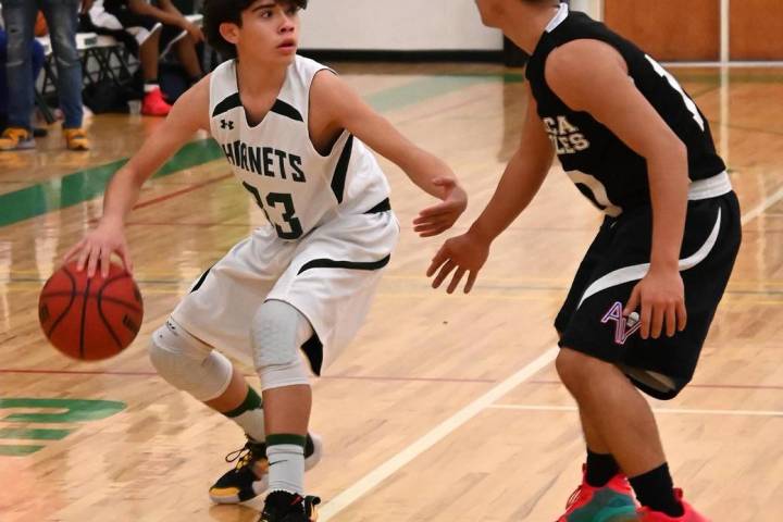 Richard Stephens/Special to the Pahrump Valley Times Beatty's Ethan Mendoza looks for a passing ...