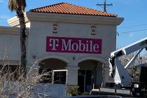 Jeffrey Meehan/Pahrump Valley Times T-Mobile works to open a new store at 20 S. Highway 160 at ...