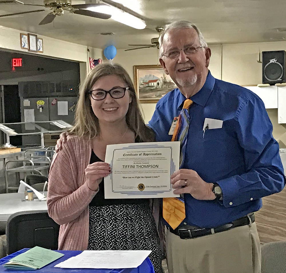 Robin Hebrock/Pahrump Valley Times Tiffini Thompson poses with Pahrump Lions Club member Bill N ...